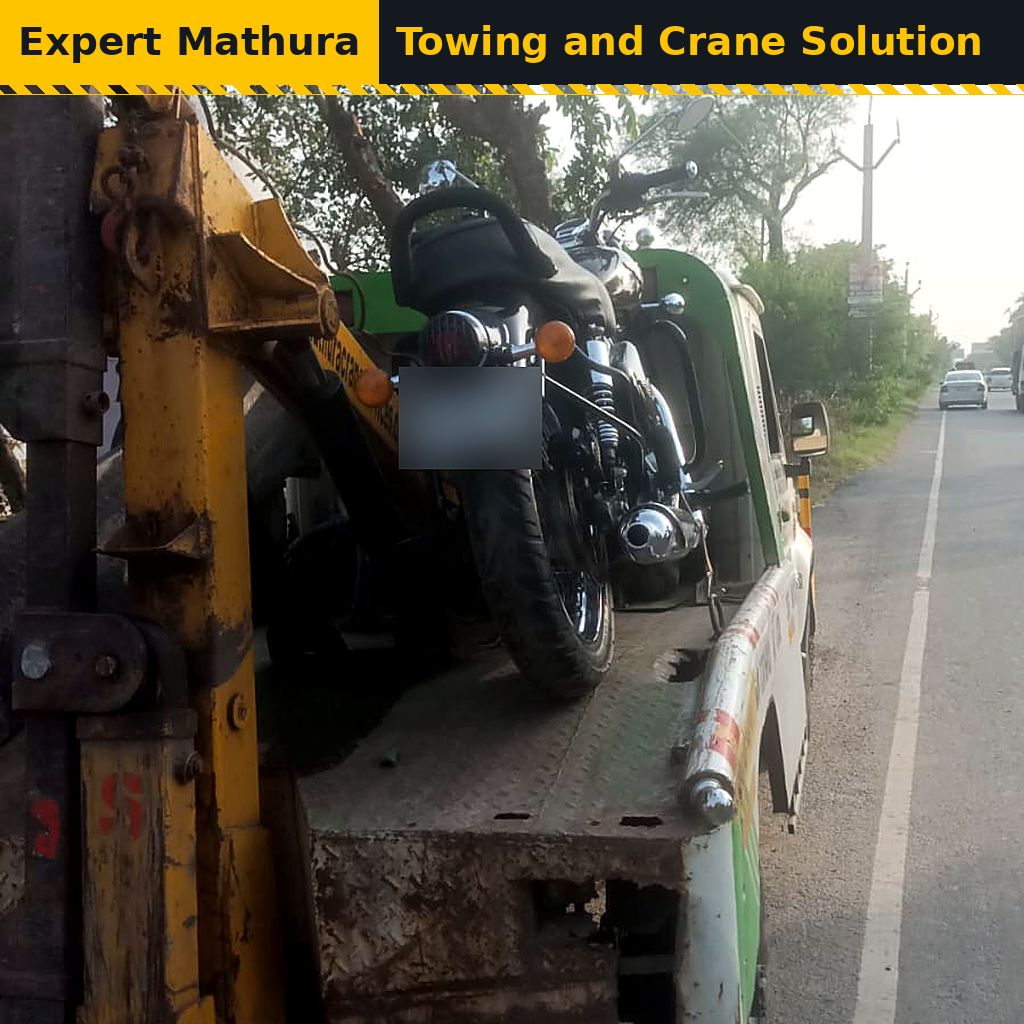 Motorcycle secured on a recovery van for bike towing in Mathura and Vrindavan